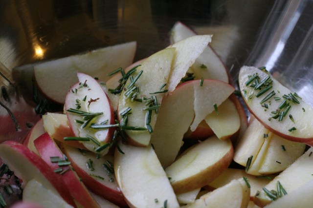Sliced Apples Tossed in Olive Oil and Chopped Rosemary