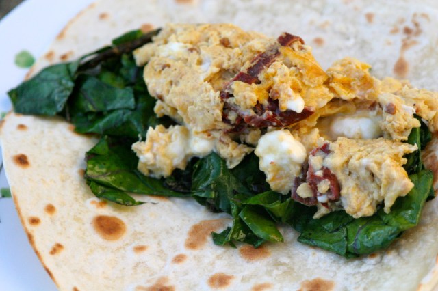 Chipotle egg tacos with greens and Israeli feta.