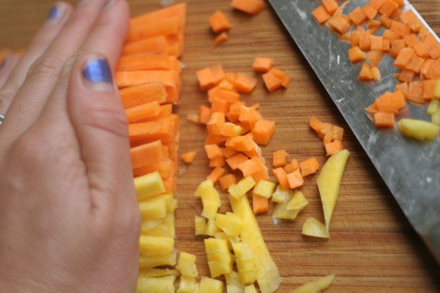 Chopping carrots for the agnolotti